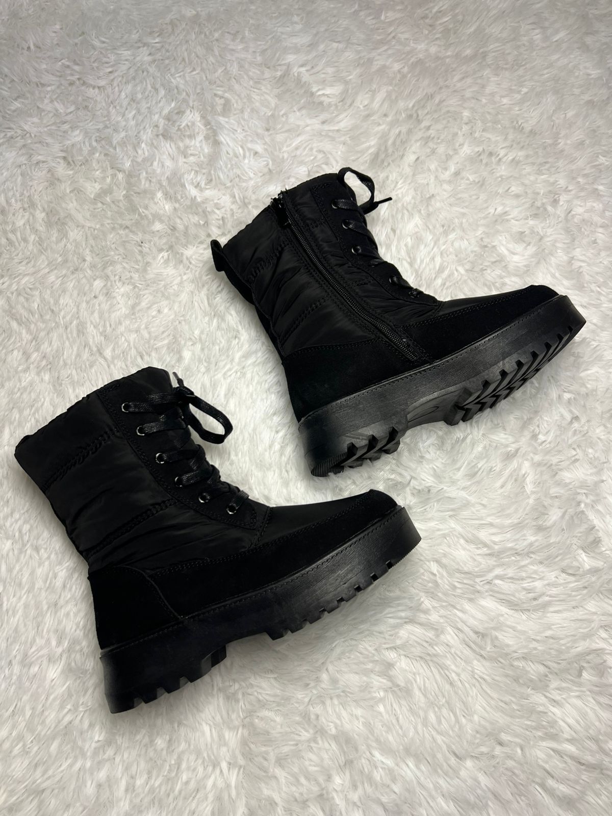 Botin impermeable negro media caña