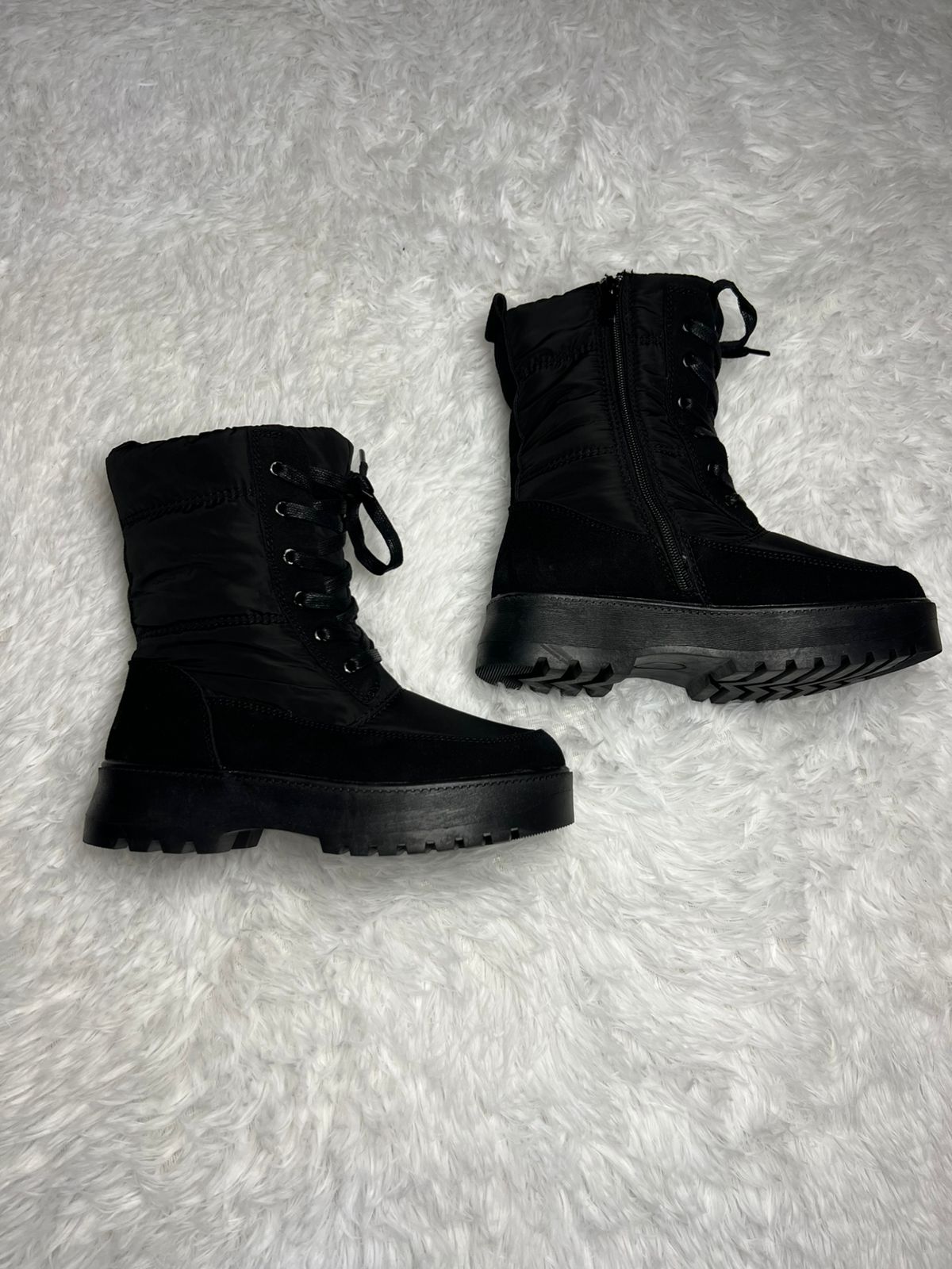 Botin impermeable negro media caña