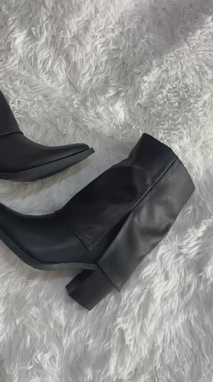 Botas de tacón medio